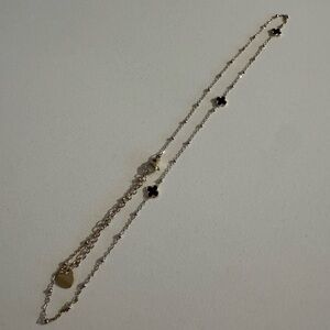 Elegant Gold and Black Clover Necklace